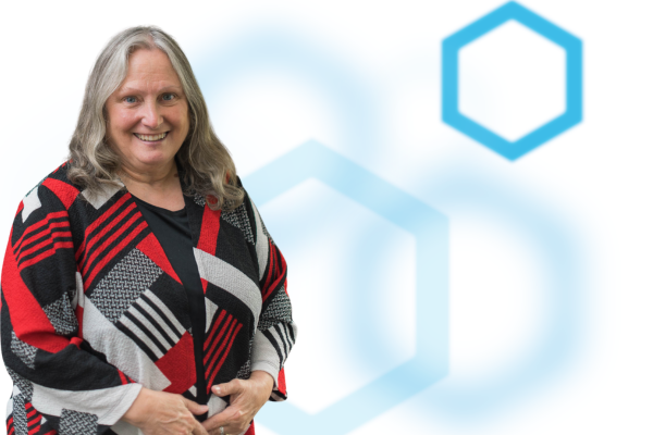 Dorine Bennett on the left over a white background with blue hexagons. 